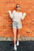 These shorts are my staple for this summer (Summer 2019.) I wear them ALL THE TIME. The color is great and looks good with anything. (I always pair with a white/ivory crop top and white Keds.) I love the front bow tie. True to size and the fabric is great. I would recommend ironing them before you go out since the bottom of the shorts get kind of wrinkly. (I guess this is true of most shorts/pants, lol.) - Emily R.