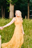 I bought this dress for our engagement pictures, and I basically haven't taken it off since. It's AMAZING! You can go bra-less and don't need any kind of sticky bra/cover, and it's so so incredibly flattering. Selfishly I don't want to rate the dress because I don't want anyone else to have it :) - Stephanie W.