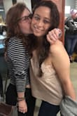 I wore this shirt with distressed jeans and pumps. It was comfortable for the indoor concert (which was packed and hot), and fit well. Was a bit tight on the chest area, but not horrible or really noticeable through out the night(about 4-5 hrs.). Would definitely recommend! - Alejandra E.