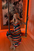 Loved this dress and received lots of compliments on it.  Added bonus, it is incredibly light and comfy for a summer night in Miami.  The back is adorable! - Julie P.