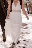 Bought this dress for our wedding elopement and loved it! The quality is great and the fit is snug, but flexible due to the lace back. 
I did have a beaded belt added to make the dress pop a little more. - Shelby M.