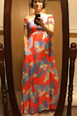 I initially purchased M and was so excited but had to exchange it for L - my shoulders are too broad for M. If you are in between sizes because of the shoulder width, size up. Gorgeous dress, material, how it flows, how it makes you feel. I will wear it all summer. - Martina Z.