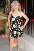 I found it very comfortable. I sized up. I am usually a medium, but I wanted it comfy and it was very cool when I wore it dancing. - Leah K.