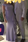 I loved the dress! Very classy and material is great, no one would ever guess the price. I had to get it altered because of the length but everything else was perfect. - Yleibis S.