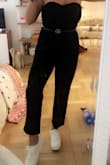 This is by far the best jumpsuit I have ever owned. It fits perfectly and is so flattering. It stretches so it has some give, but true to normal size for sure. I have short legs and it still falls perfectly to the ankle. I wish they had more colors! - Emily H.
