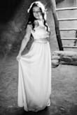 The dress fits great! I love the material. It's a bit long but I am 5'2. Highly recommend. - Jasmine C.