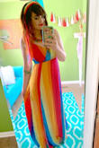 This dress is awesome!! I love that it has a tiny little snap at the bust so that you can leave it open or button it up if you prefer that look, or just want to cover up more. I am super happy I went with the medium,. I chatted with a fit specialist who suggested the medium for my measurements and because the hips are flowy I shouldn't have an issue with my hips- and she was correct! If anything it is actually a tad loose, but I wouldn't change the size. It just makes it more comfortable! It is very flowy great Summer dress, and the colors are very pretty and vibrant. I love rainbow everything, so I knew I had to have it- and I'm super happy I snagged it on sale! Love it love it, thank you!! - Alyssa M.