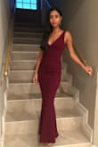 This dress was absolutely beautiful! It was simple yet elegant. The open v-neck cut in the front gave it a sexy touch. My boyfriend absolutely loved the dress on me. I did have to get it tailored though. It was too long & too loose. - Gloria L.