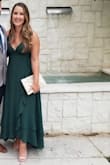 I wore this to a wedding, and I was overall very happy with it. I got tons of compliments. 
Pros-The emerald green color was beautiful, and the material is great and seems to be very well made. It was easy to walk and dance in since the front is shorter than the back.

Cons-The straps weren't the most comfortable for me, even though they are adjustable I didn't want too much cleavage at a wedding, so I had to make them pretty tight or it would hang too low.
The dress is very long. I wore 3-4 inch tall heels, and it was still touching the ground in the back.
I was also kind of disappointed it doesn't show any leg at all where the slit is, but the ruffles on the dress were beautiful. - Lindy C.