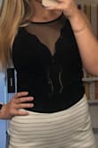 I'm so excited to wear this for a night out! Just have to wear a thinner strapped bra so it won't show. It's soft and has two button snaps at bottom to not ride up and is really cute! - Nina E.