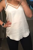 Very cute! I love that the straps have an adjustable slide like a bra, so the straps can be shortened or lengthened accordingly! It came very wrinkled though. I will have to wash and iron before wearing. - Nina E.