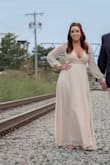 I bought this dress for my engagement shoot and it was perfect! They only had smalls available, and I was worried it wouldn't fit my chest. I'm glad I just went ahead and ordered the small because it fit PERFECT! The front is a little low but the Sexy Illusions by Victoria Secret Lightly Lined Demi bra is low enough that you can't see it and provided enough coverage where I didn't feel like I was going to fall out of the dress. I would HIGHLY recommend this dress for any photo shoot. It photographs so well and our pictures came out amazing.

Also, customer service at Lulus is fantastic! A button popped off the sleeve and I was worried the other ones would fall off too. I contacted CS and they were amazing and offered several solutions to fix the problem. - LAUREN T.