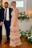 I got this dress for my sister-in-law's wedding. It was perfect for the occasion! It stood out without taking attention from the bride. It was chic w/o being revealing. I'm 5'9" and was able to wear this dress with heels and it not be too short. I'm a size 6 and ordered a medium. It fit a little loose in the mid-section, but it also didn't feel too tight while sitting, so that was a plus. The ONLY drawback to this dress is that there were a LOT of extra strings & thread hanging from the the bottom of the ruffles. They were easily cut off, but there a bunch of them! Highly recommend! - Jessica C.