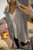 I am actually about to wear this jacket out today to brunch. It's so versatile, dress up or down, so soft and comfortable. I got a Small knowing it was going to be on the looser side but that's how I like it - drapey look. Would buy another color - it's a must have in your wardrobe! - Olivia J.