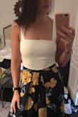 I've been searching for a white bodysuit that I could go braless in (hate them) and that was NOT full coverage in the bottom (I wear bodysuits to avoid panty lines, after all)! This one is perfect. I had to return the first one I ordered as it came with a snag but customer service was amazing and I've worn my new one with no snagging issue. Highly recommend! - Hope L.
