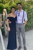 I wore this dress as a bridesmaids dress and I felt amazing in it. The material is very thick which looks nice on, but was a bit warm for an outdoor wedding. The slit in the side is classy, and the dress didn't slide down at all. It was very long so I had to hem it, but made no other alterations. - Tiara B.