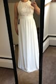 It's okay! Pretty, lightweight and comfortable. I didn't like that the design under the bust wouldn't stay in place... it kept folding over. Also, just above that you could see my roll (with and without a bra). but that's me not the dress. - Kianna G.