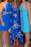 I wore this to a wedding in Capri and it was perfect, flowy and flattering! The blue is bright and I love how it the hem comes up in the front to show off cute shoes. It is definitely long. The back was brushing the ground and I had heels on. I did make one adjustment - I sewed the top closed where I wanted it to stay crisscrossed, otherwise it would have been much too low cut for a wedding. Buy this dress. You will love it! - Eileen L.