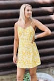 The dress fit perfectly. The straps to the tie in the back are all connected and adjustable making it fit however you want. Wore it for a wedding and was great. Never have been disappointed by Lulus even if it's a last minute pick! - Keylee C.
