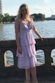 I ordered this dress for a summer wedding and I love it! It fits like a glove besides the top- wish it had cups. I'm flat chested but the adjustable straps helped fix this problem. I highly recommend this dress!! - Camryn D.