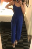 I was a bit worried on ordering it at first because since I'm very thin, certain jumpsuits never look flattering on my body. But wow! You have now gained a new customer. This jumpsuit fit beautifully, I felt so confident in it all night because it makes your body look so flattering and makes you look like you have curves. The quality is very nice, and it's well made. I'm obsessed with it. Will definitely be making good use of it for a few other events. Picture does it no justice. Looks so pretty in person.. - Irene R.