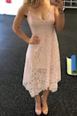 This dress definitely gives you some wiggle room! Super elegant and enough structure to hold you in and keep you looking elegant. - Jennifer J.