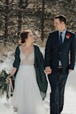 My husband and I eloped this past January, and I hadn't planned to wear a white dress until I found this one. I fell in love instantly, and when I tried it on it fit perfectly. The hemline was too long for me to walk comfortably, so I ended up having it tailored so that we could walk in the snow. I love this dress! - Allison V.