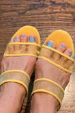 Comfortable, fits true to size. Not narrow which is perfect for medium to wider widths. I have them in yellow and love the pop of color. Soft suede toe adds to the comfort. - Trachelle H.