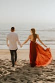 This dress fit perfectly and looked gorgeous for my engagement photos. I have gotten so many compliments on the dress and how it looked for our beach photos! - Nicole A.