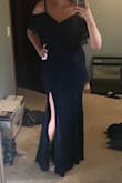 This dress is better than I expected. It is very flattering without showing every lump and bump. Sexy and elegant - Alissa A.