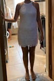 Fits perfect! I'm about 145-150lbs 5'8" and ordered a large. The color is a very soft pink. I love this dress!! - Joanna T.