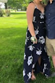 I wore this dress to a summer wedding (90 degrees!) and it was perfect!! I loved how it flowed and how thin, yet not see through the material was! It was a little hard to get on the first time with all the strings but then it gets easy. The chest area is very revealing but I put a snap in it so to make sure it didn't show anything. Overall, a very pretty dress that is perfect for a summer wedding!! - Chelsea G.