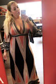 I absolutely love, love, love this dress! This dress says yes to every curve so tastefully. If you have naturally large breast you'll def need those sticky lift bras cause there's no way to wear a bra with this dress but so nice. You can def wear this during the day and dress it up at night. Awesome piece to add to your closet. - Marisa N.