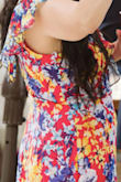 Purchased this for a May wedding and I'm so glad I got it! I ordered it about 2-3 weeks before the wedding just in case I needed to return or adjust the dress.

I am 5'1 and even though I wore 5.7" yellow platform heels, I still needed to hem about 2-3 inches off the dress which I did at a local tailor shop.

I could've had the waist taken in a bit, but I left as is. I wore a strapless bra (34DD) and the bust area fit perfectly.

I'm in love with this dress, and I already can't wait to wear it again for another special occasion! - Anet S.