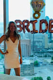 I looked everywhere for a bachelorette dress, and tried on at least 5 other dresses. Even some of the other white dresses at Lulus. This one saved me! I'm 5'8.5" so many white dresses end up being too short on me. This one was the perfect length to be classy yet sexy! I paired it with gold layered jewelry and nude heels. Got so many compliments. The fabric is thick and good quality. I wore smoothing knockoff spanx for no panty line and some bra tape to keep me secure since you can't wear a bra and had no problems. BUY THIS DRESS! You won't regret it! - Sarah W.