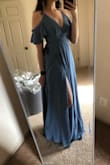 After reading the reviews I did order a size down (normally a small) the xs is absolutely perfect. As someone who's 5'9" I usually have to worry about the length of clothing but this dress touches the ground and will look great for my engagement photos!! 10/10 recommend - Courtney A.