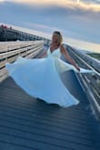 I ordered a small and it fit perfectly. This dress was absolutely beautiful and I was completely happy with my purchase. - Casey K.