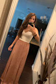 Loved this skirt! It was a little long on me but I just rolled the top a little and it was perfect! Perfect for an outdoor bbq. Very light weigh but not see through ! - Amy V.