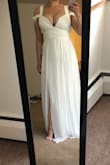 Like this dress but think it would look better without the straps that kind of hang off the shoulder. I don't know if I needed a bigger size or what but the fabric under my bust and off to the side kind of bulges out. This dress makes me look like I have a slimmer waist which I love! - Kianna G.