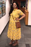 Super pretty yellow dress! It fit perfectly. So flowy and light. Paired t with red earrings and nude heels. Just Beautiful. - Elvia A.