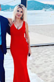 The dress was simple but in a very nice material which is what I wanted. 
I had it altered to fit a bit tighter in the waist area and ordered very high heels as it is pretty long. - Alexandra D.