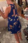 This dress runs True To Size (TTS). I love the color, very bright and vibrant. - Alexandra F.