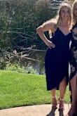 This dress is true to size. The fabric is thick and super comfortable. It also has adjustable straps which is great for short people! The straps are silky which feels nice on your shoulders if you are going to be wearing the dress all night. - Alexandra F.