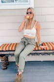 I love the style of this top! It is a little large, but I wouldn't size down; I feel like it would've been too small. I love how you can either wear a bra or not. It's supportive enough believe it or not! Perfect for summer! I also received a lot of compliments! - Emily R.