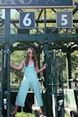 Perfect summer jumpsuit. The fabric is very lightweight and comfortable. Tad overpriced but it is very nice. I don't really need to wear a bra. I sized up because of my height, but there is stretch in the back. - Kendall B.