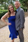 I wore this dress for my brother's wedding and I LOVE it! I got so many compliments! I love the way it fits and that it has a small strip of rubber around the top to help keep it up. I wore a strapless bra with it without issue! I highly recommend this dress! - Stephanie R.