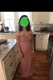 I love this dress. I am pregnant, but it doesn't look very maternity-like which is good. I'm wearing it as a bridesmaid and not to anything baby related. I'm not that far along in this pic and have another six weeks until I wear it, but there's plenty of room to grow. It doesn't seem to require a bra. It's too long but so is every dress I order. - Rebecca G.