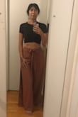 I love these high-waisted pants that fit my wide hips and tall length comfortably and flatteringly. Its elastic waist on the back allowed me to wear these high enough to wear with a shirt that showed more skin than I wanted. - Amy L.