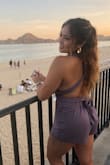 This style is super cute! And the material is flowy. Love that you can make the top into a variety of different styles, reminds me of one of those convertible bridemaid dresses. But it's SUPER short! Even for me (I'm 5'2)!! Still like it though. - Jean M.