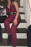 I love this jumpsuit! The color is very flattering and the material is comfy. Just a heads up it is very thin so it's definitely not warm in cooler weather. Also, the material shows even just a drop of sweat/water so you might want to consider that depending on what you're wearing it for. - Shannon M.
